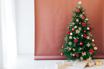 Christmas tree pine with gifts for the new year postcard banner brown background