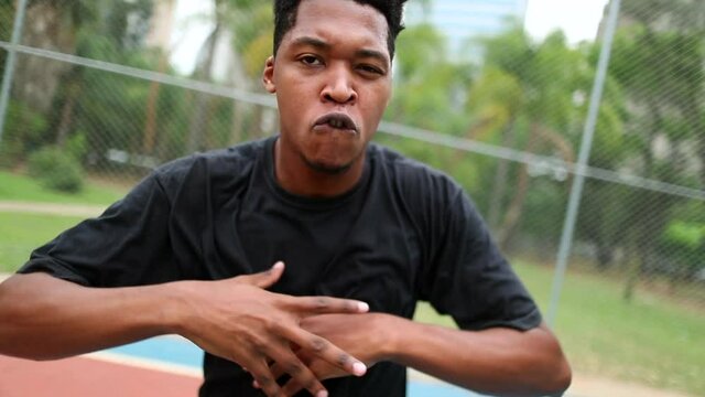 Black African man performing urban dance freestyle krump