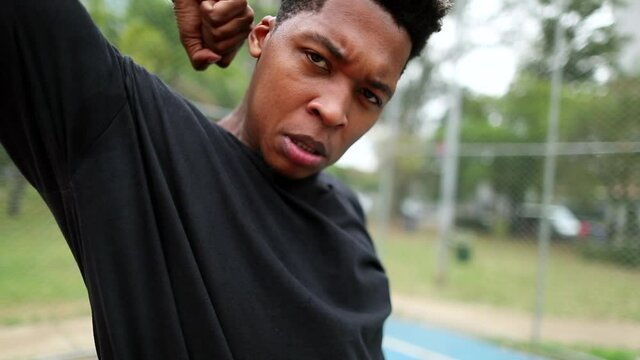 Black African man performing urban dance freestyle krump