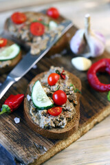 Sandwiches with pate on a wooden board. Healthy snack. Selective focus. Macro.