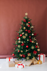 Christmas tree pine with gifts for the new year postcard banner brown background