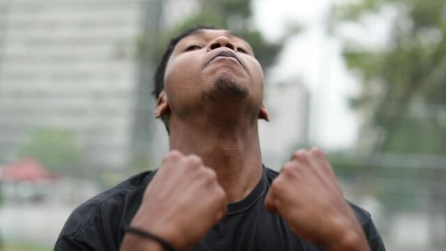 Black African man performing urban dance freestyle krump