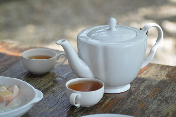 Obraz na płótnie Canvas tea cup and tea pot
