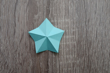 A blue paper star