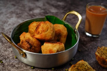 Sukhiyan - Kerala deep fried tea time snack with green gram filling, selective focus