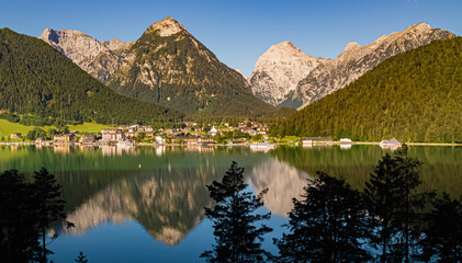 Beautiful alpine view with reflections at the famous Achensee, Pertisau, Tyrol, Austria