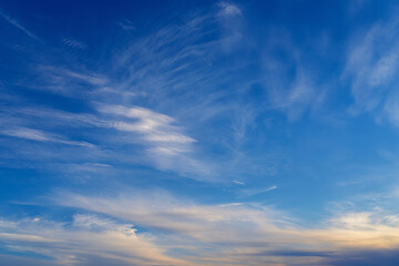 Dramatic sky with white clouds.