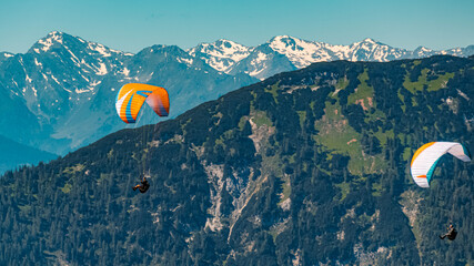 Beautiful alpine view with paragliders at the famous Rofan summit, Maurach, Achensee, Pertisau,...
