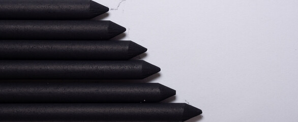 Black chalk closeup detail on white background