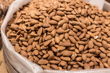 Organic almond nuts top view. almond background.