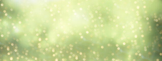 Golden green bokeh background. Holiday festive background.Abstract Christmas New Year banner - obrazy, fototapety, plakaty