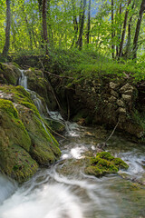Picture of a waterfall in the Plitvice Lakes National park in Croatia with long exposure during daytime