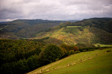 landscape with hills and clouds in Luxembourg