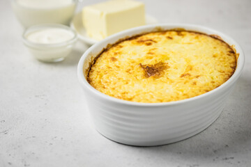 Loaded mashed potato meatloaf casserole in a baking dish. Space for text.