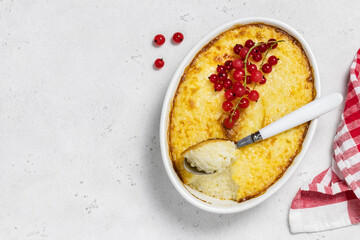 Rice baked pudding in a baking dish. Space for text, top view.