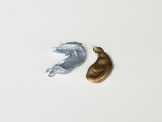 Obraz premium Acrylic Paint, Silver or Grey and Gold Smears, On White Background