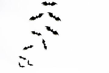 Flying bats group isolated on white background.  Halloween symbols.