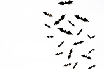 Flying bats group isolated on white background.  Halloween symbols.
