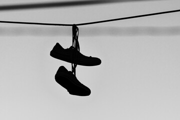 Old Sneakers Over a Power Line