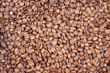 Raw coffee beans in sacks, coffee shop in Athens, Greece.