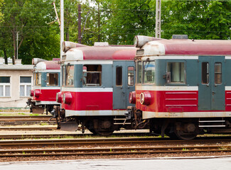 Three red locomotives