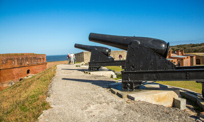 Fototapeta na wymiar Cannons and fortifications at Fort Clinch State park. The Fort is located in Florida on a peninsula near the northernmost point of Amelia Island, along the Amelia River