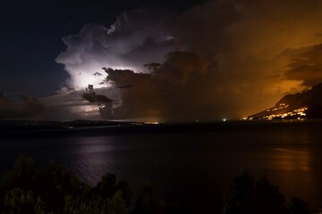 Fototapeta na wymiar Dark dramatic sky. Thunderstorm over the sea. Brela Croatia, Makarska riviera