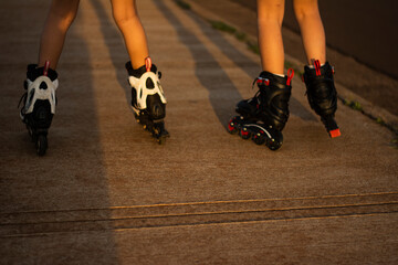 Fototapeta na wymiar legs with roller skating shoe. outdoor. lifestyle. Copy paste