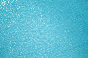 Fototapeta na wymiar Top view Closeup blue water rings, Circle reflections in pool.