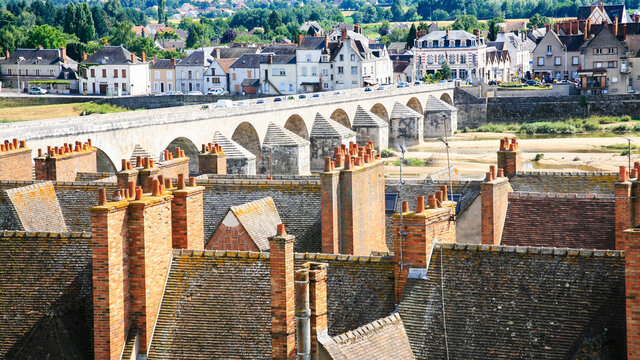 GIEN, FRANCE - JULY 9, 2010: above view of Gien town and Loire river in summer day. Gien is a commune in the Loiret department on the Loire River