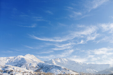 Mountain valley in winter. Hiking and mountaineering. Top view of the mountain range of the Tien Shan mountains in Uzbekistan