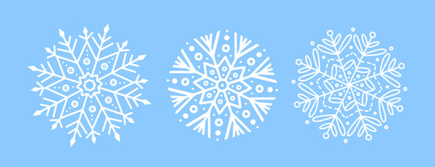 Set of cute openwork snowflakes on a sky blue background. Cute and ornamental snowflakes for New Year's baby prints, cards, New Year's tablecloth decoration, wrapping paper for Christmas gifts