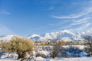 Layner, the village of Chimgan, Uzbekistan. Winter mountain snow landscape