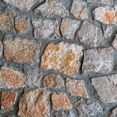 colorful stone wall closeup, natural textured background