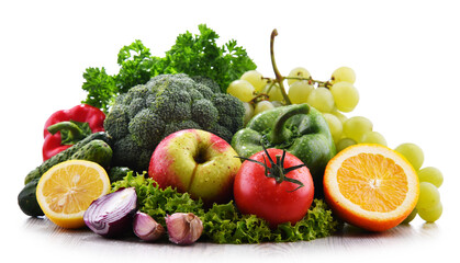 Composition with fresh vegetables and fruits isolated on white