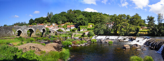 Tambre river and old bridge Maceira, La Coruna, Galicia, Spain - the Pilgrim's Road to Santiago de...