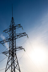 high-voltage pole wires power lines at sunset electricity distribution station.high voltage...