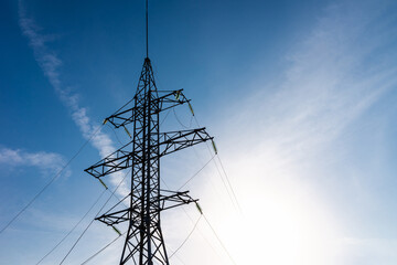 high-voltage pole wires power lines at sunset electricity distribution station.high voltage...