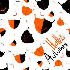 Mask for the face against covid-19 in flat style. Autumn seamless pattern for textiles, umbrellas. Orange black ornament positive, cheerful. Coronavirus protection symbol.