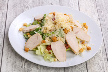 Caesar salad with chicken breast