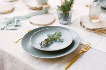 Elegant Christmas dinner service in light and blue colors