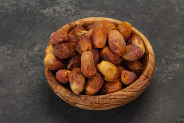 Sweet tasty dry dates in the basket