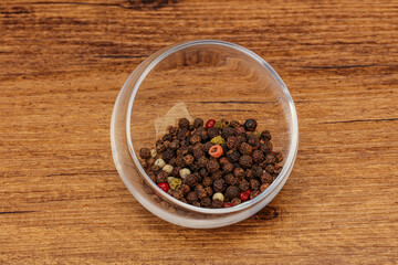 Peppercorn heap in the bowl