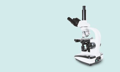 Using a biological microscope. Close up of a microscope. Scientific research concept, using a microscope. Medical examinations, searching for bacteria, diseases, blood tests.