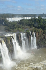 Rainbows over the mighty and powerful Iguzu (Iguacu) Waterfalls between Brazil and Argentina