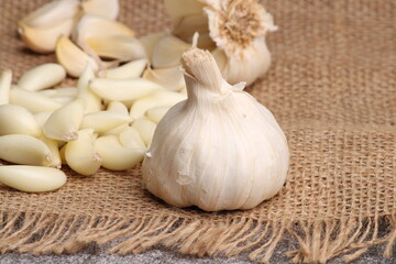 Raw garlic Cloves and Bulb. on barlup.