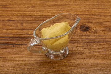 Dijon mustard sauce in the bowl