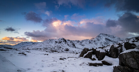 Snow on the mountains of Snowdonia National Park during winter, Wales, UK