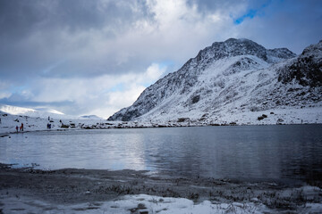 Llyn Idwal and snow on the Tryfan in background, Snowdonia National Park during winter, Wales, UK