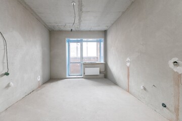 interior of the apartment without decoration in gray colors
